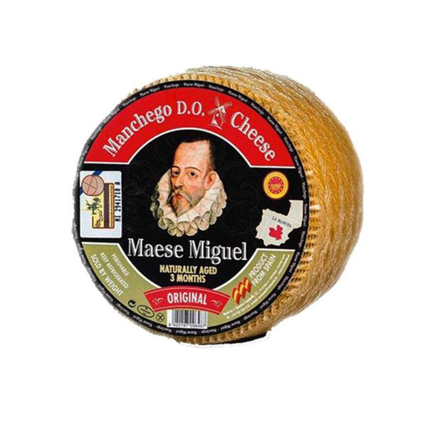 Manchego D.O. Cheese wheel with Maese Miguel branding on a white background